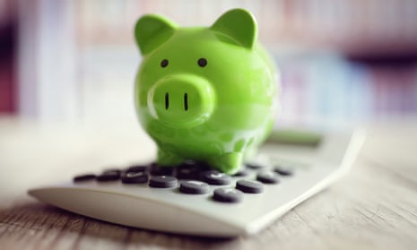 Piggy bank on a calculator