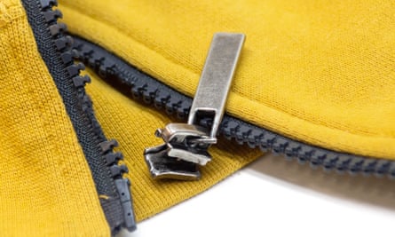 a broken zip on a yellow jacket