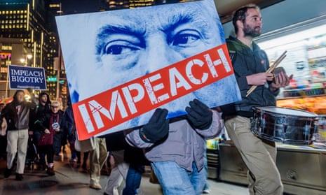A protest calling for the impeachment of Trump in New York City on 30 November 2017.