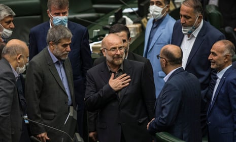The recently elected Iranian parliament speaker Mohammad Baqer Qalibaf (centre) has said negotiation with the US is ‘harmful and forbidden’