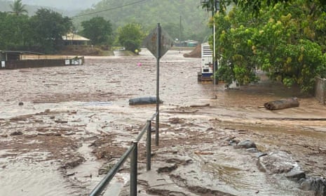 The remote Aboriginal community of Wujal Wujal has been inundated after days of rain. Council CEO Kylie Hanslow says crocodiles are swimming through the town, and flood waters are expected to rise again on Monday afternoon. Areas across far north Queensland are on emergency flood alert.