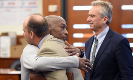 Dewayne Johnson (centre) was awarded £226m in damages from Monsanto.