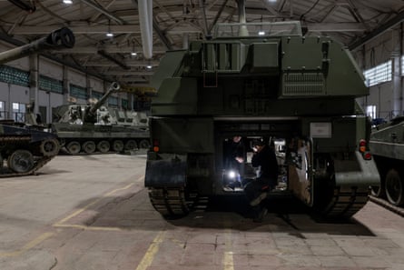 Mechanics repair AS90 self-propelled howitzer system at the location