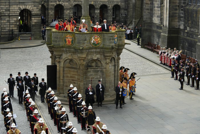 The Lord Lyon King of Arms reads a public proclamation to the people of Scotland to announce the accession of King Charles III, outside St Giles Cathedral in Edinburgh.