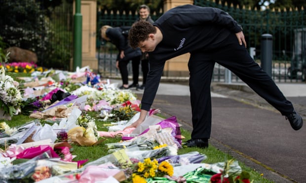 Members of the public pay tribute to Queen Elizabeth II at the Government House of Victoria in Melbourne.
