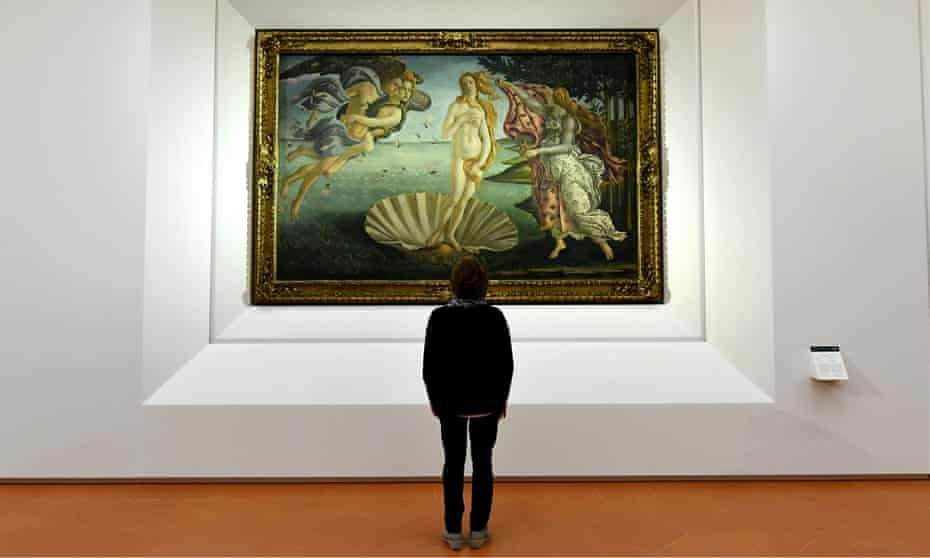 A man looks at Botticelli’s The Birth of Venus