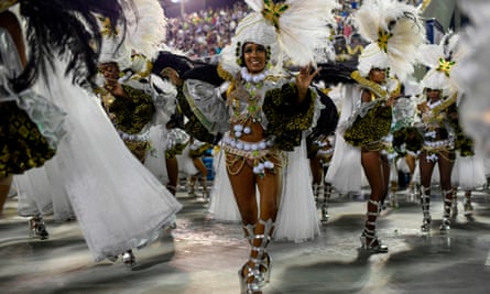 Members of Mocidade Independente de Padre Miguel perform during carnival.