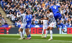 Jamie Vardy rises above the defence to score Leicester’s second goal against West Brom