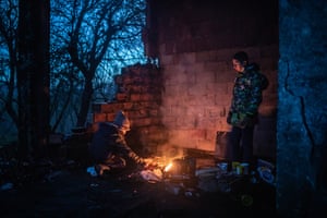 Dozens of migrants and refugees, mainly from Afghanistan, live in makeshift shelters in an abandoned factory near Bihać