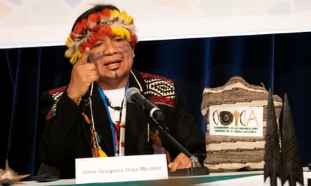 José Gregorio Diaz Mirabal, indigenous leader, in feathered headdress