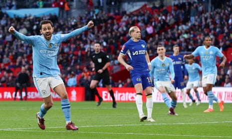 Bernardo Silva of Manchester City celebrates scoring his team's first goal during the FA Cup semi-final against Chelsea.