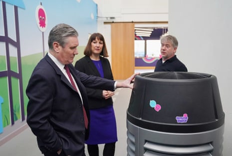 Keir Starmer and Rachel Reeves, being shown a heat pump demonstrator by Octopus Energy CEO and founder Greg Jackson during a visit to Octopus Energy in Slough today.