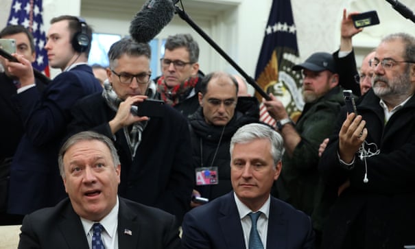 Mike Pompeo speaks to members of the media as National Security Adviser Robert O’Brien listens on Tuesday.