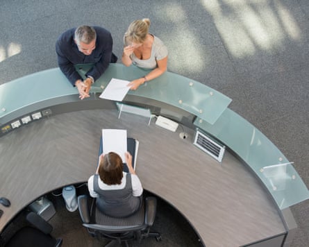 Business couple at hotel reception