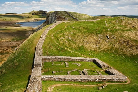 Ancient wall on a hill and the foundation stones of a fort.