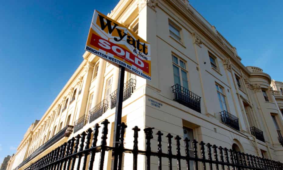 House sold sign on a period home in Brunswick Terrace, Hove.