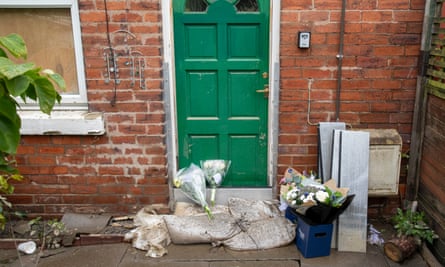 Flowers against the front door of Maureen Gilbert's home