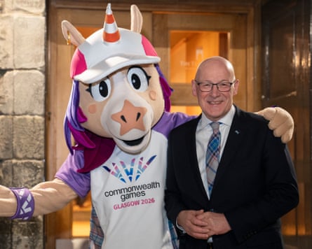 Scotland’s First Minister, John Swinney with Commonwealth Games mascot Finnie at a reception in Edinburgh.