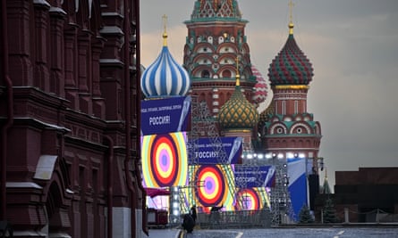 Signs on Red Square reading “Donetsk, Luhansk, Zaporizhzhia, Kherson, Russia”.