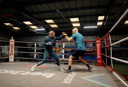 Molly McCann spars with her trainer Jay Carney in the No Limits Boxing Club in Liverpool