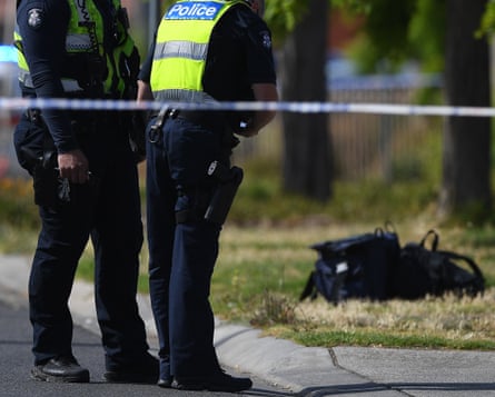 Police are seen at the scene of a stabbing death adjacent to Keilor Plains Station in St. Albans in Melbourne, Sunday, Dec 22, 2019.