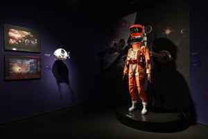 Prints of space and spacecrafts by concept artist Roy Carnon (left) and a space suit worn in the Clavius Base scene in 2001