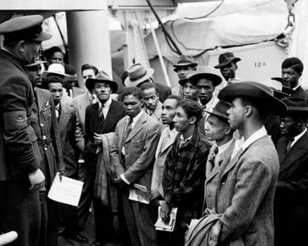 Jamaican immigrants are welcomed after the Empire Windrush docked at Tilbury in Essex, 22 June 1948.
