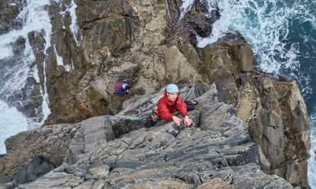 Anna Fleming climbing Shawbost Pillar on the Isle of Lewis.