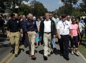 Donald Trump visits an area impacted by the storm.
