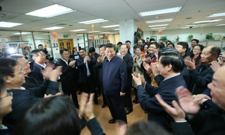 Chinese President Xi Jinping, centre, talks with editors in the general newsroom of the People’s Daily in Beijing during a high-profile tour of the country’s top three state-run media outlets.