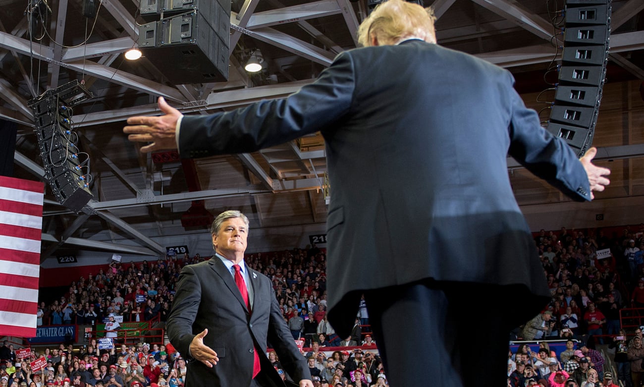 The Fox News host Sean Hannity greets Donald Trump at a Make America Great Again rally in Cape Girardeau, Missouri, in 2018.