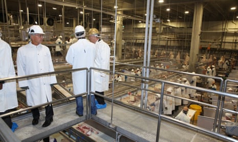 Officials tour meat processing facility