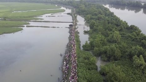 Drone footage shows Rohingya refugees entering Bangladesh – video