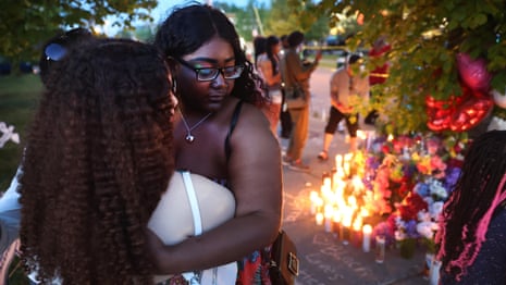 Buffalo shooting: vigil held after 'racially motivated' massacre leaves 10 dead – video report