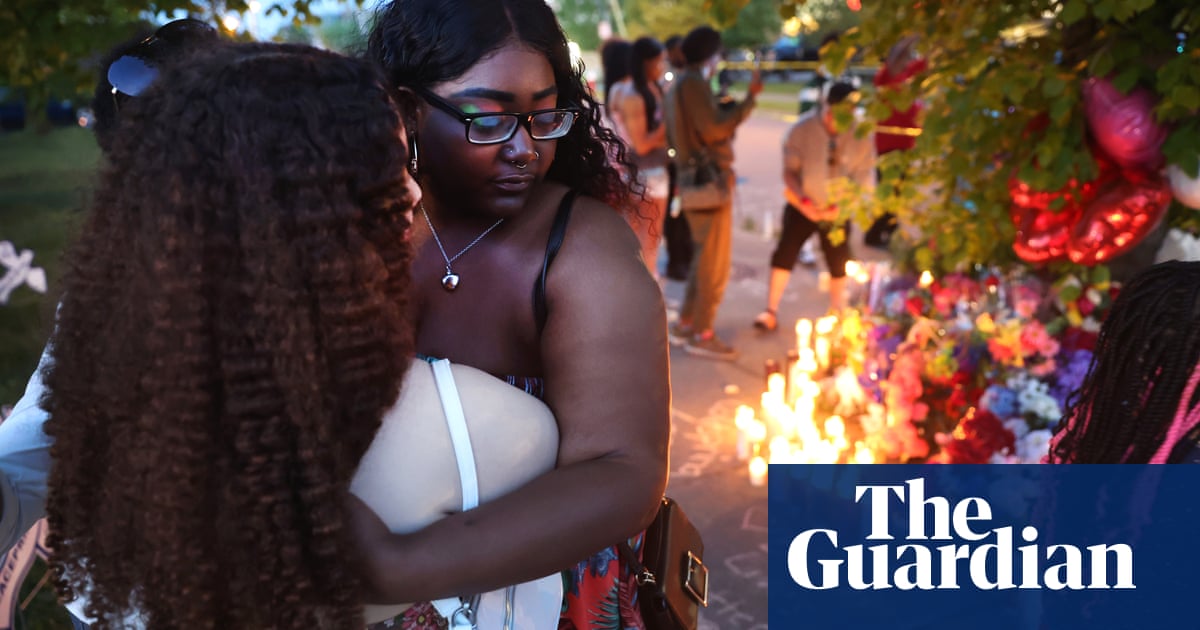 Buffalo shooting: vigil held after 'racially motivated' massacre leaves 10 dead – video report