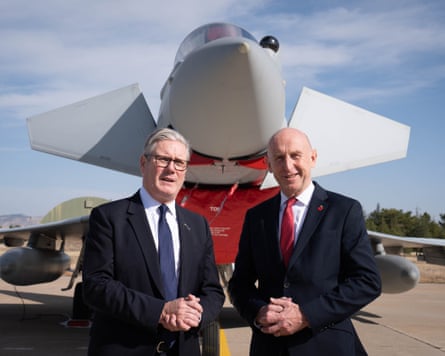 Keir Starmer and John Healey in front of a UK Typhoon fighter jet