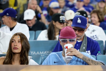 Justin Bieber and Hailey Bieber watch game three of the 2025 World Series between the Toronto Blue Jays and the Los Angeles Dodgers, 2025