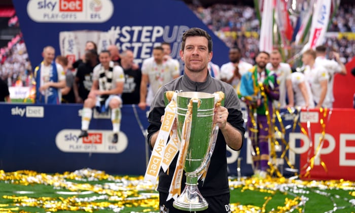 Port Vale manager Darrell Clarke with the trophy.