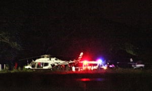 A Royal Thai police helicopter carrying the rescued boys lands at a military airport