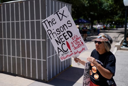a women holding a sign