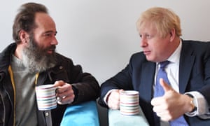 Boris Johnson alongside war veteran James Gammer during a visit to a veterans centre in Salisbury this morning.