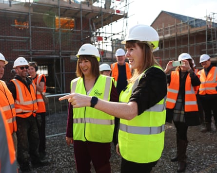 The women in hard hats and hi-viz jackets