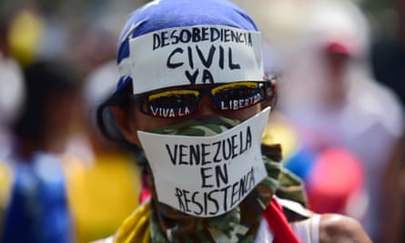 A demonstrator against Nicolas Maduro’s government in Caracas on Wednesday.
