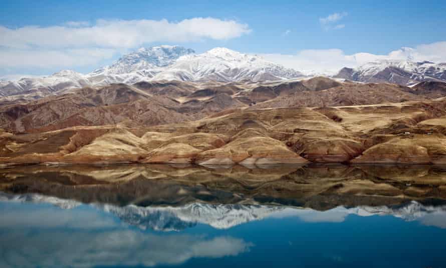 ‘A paradise of dirt tracks and waterfalls’: the Alborz mountains with Lake Taleghan in the foreground.