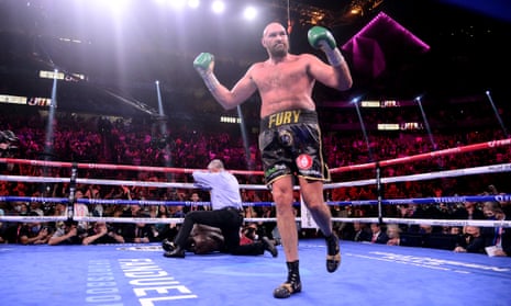 Tyson Fury walks away after knocking out Deontay Wilder to retain his world heavyweight boxing title