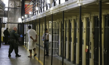 In this 2016 file photo a condemned inmate is led out of his east block cell on death row at San Quentin State Prison