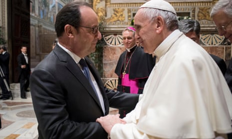 Pope Francis greets French president Francois Hollande during a meeting with EU leaders at the Vatican.