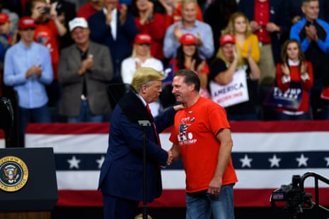 Donald Trump shakes hands with Bob Kroll, head of the Minneapolis police union, during a campaign rally.