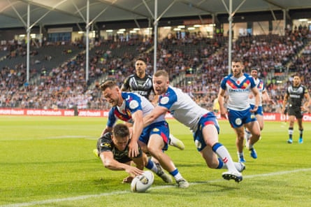 Joseph Manu scores for New Zealand against Great Britain in 2019.