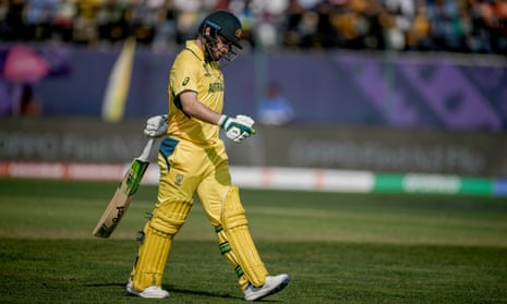 Josh Inglis walks off after holing out to Trent Boult.